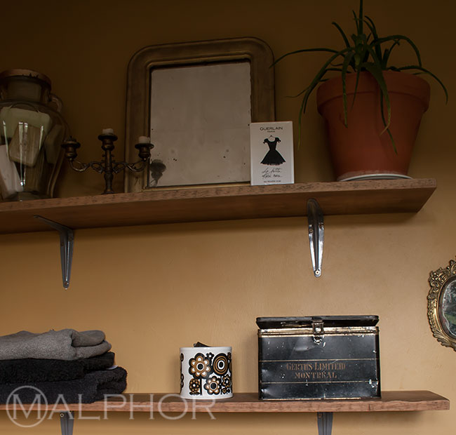 shelves with gold mirror